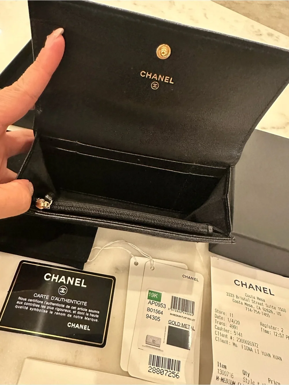 CHANEL Black Quilted Leather Wallet with Gold CC Chain Logo